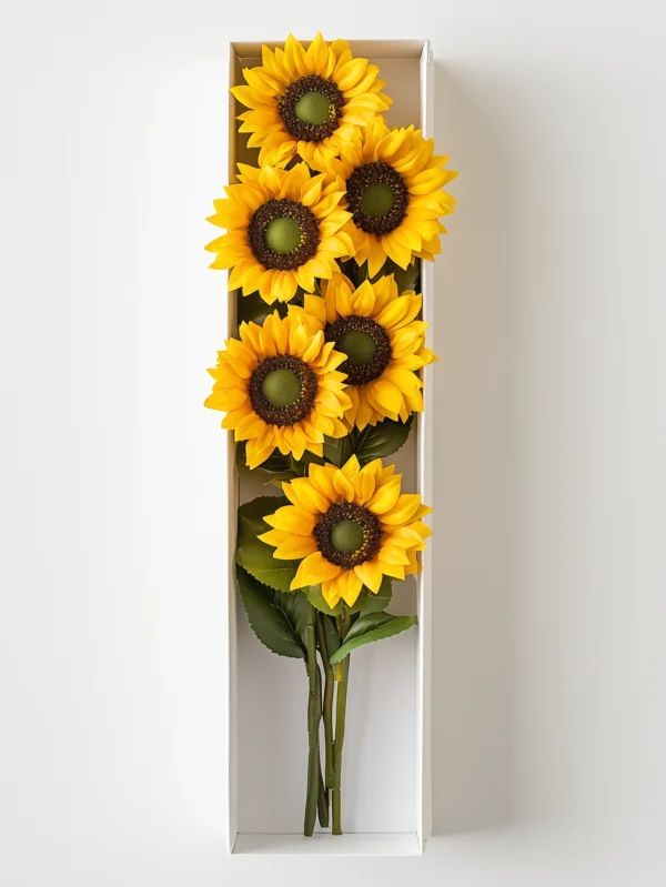 Caja premium con 6 girasoles radiantes, un detalle perfecto para iluminar cualquier momento especial con alegría y calidez.
